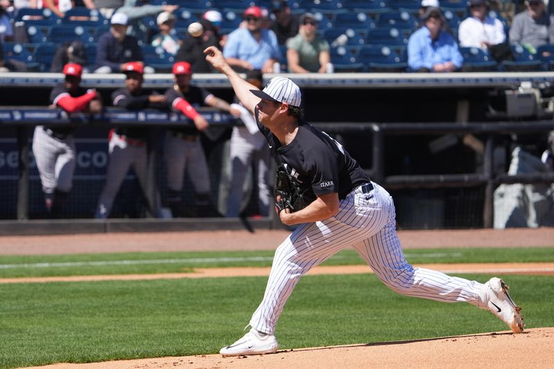 Mar 6, 2025; Tampa, Florida, USA;New York Yankees pitcher Gerrit Cole (45) throws a pitch against the Minnesota Twins during the first inning  at George M. Steinbrenner Field. Mandatory Credit: Dave Nelson-Imagn Images