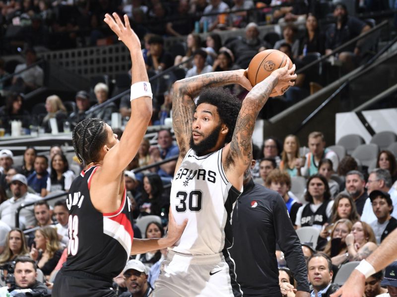 SAN ANTONIO, TX - NOVEMBER 7: Julian Champagnie #30 of the San Antonio Spurs looks to pass the ball during the game against the Portland Trail Blazers on November 7, 2024 at the Frost Bank Center in San Antonio, Texas. NOTE TO USER: User expressly acknowledges and agrees that, by downloading and or using this photograph, user is consenting to the terms and conditions of the Getty Images License Agreement. Mandatory Copyright Notice: Copyright 2024 NBAE (Photos by Logan Riely/NBAE via Getty Images)