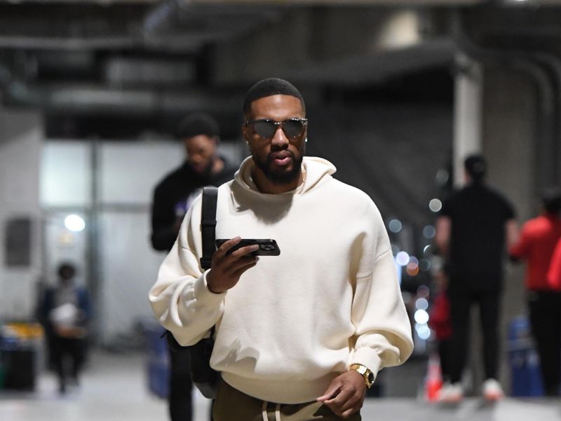 LOS ANGELES, CA - MARCH 8: Damian Lillard #0 of the Milwaukee Bucks arrives to the arena before the game against the Los Angeles Lakers on March 8, 2024 at Crypto.Com Arena in Los Angeles, California. NOTE TO USER: User expressly acknowledges and agrees that, by downloading and/or using this Photograph, user is consenting to the terms and conditions of the Getty Images License Agreement. Mandatory Copyright Notice: Copyright 2024 NBAE (Photo by Andrew D. Bernstein/NBAE via Getty Images)