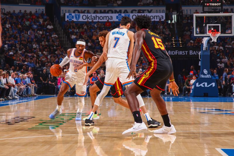 OKLAHOMA CITY, OK - OCTOBER 27: Shai Gilgeous-Alexander #2 of the Oklahoma City Thunder dribbles the ball during the game on October 27, 2024 at Paycom Center in Oklahoma City, Oklahoma. NOTE TO USER: User expressly acknowledges and agrees that, by downloading and or using this photograph, User is consenting to the terms and conditions of the Getty Images License Agreement. Mandatory Copyright Notice: Copyright 2024 NBAE (Photo by Zach Beeker/NBAE via Getty Images)