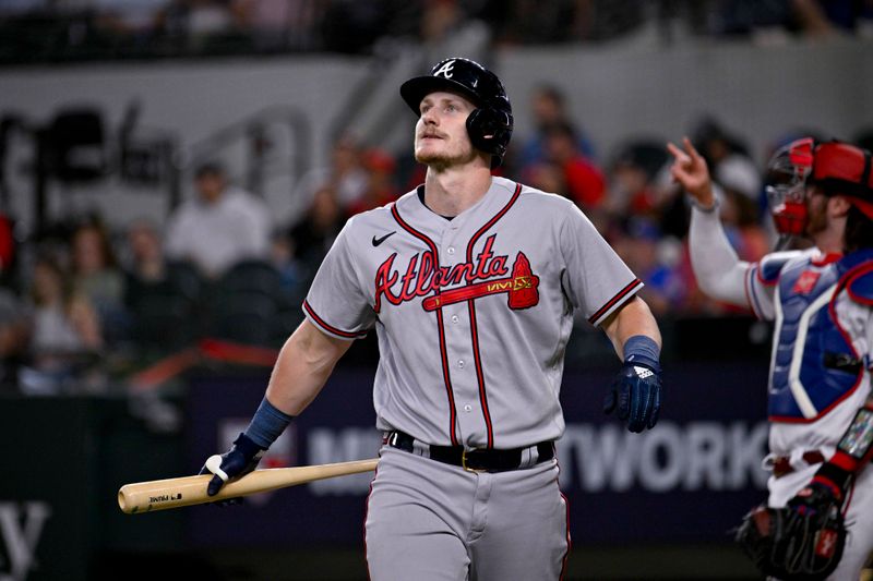 May 16, 2023; Arlington, Texas, USA; Atlanta Braves catcher Sean Murphy (12) reacts to striking out against the Texas Rangers during the third inning at Globe Life Field. Mandatory Credit: Jerome Miron-USA TODAY Sports