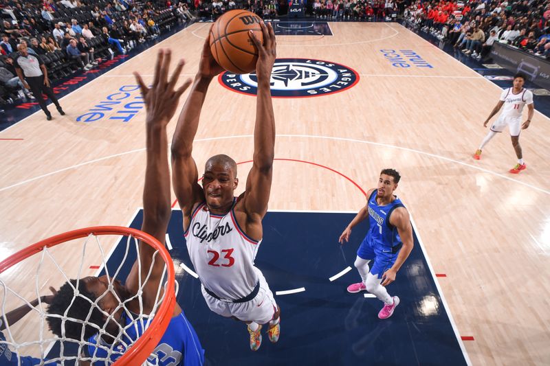 INGLEWOOD, CA - OCTOBER 14: Kai Jones #23 of the LA Clippers dunks the ball during the game against the Dallas Mavericks on October 14, 2024 at Intuit Dome in Los Angeles, California. NOTE TO USER: User expressly acknowledges and agrees that, by downloading and/or using this Photograph, user is consenting to the terms and conditions of the Getty Images License Agreement. Mandatory Copyright Notice: Copyright 2024 NBAE (Photo by Juan Ocampo/NBAE via Getty Images)