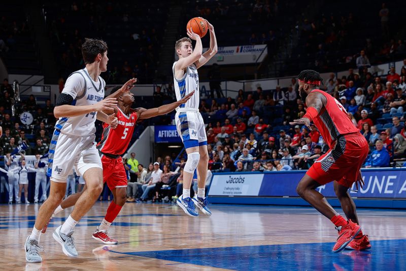 Feb 10, 2023; Colorado Springs, Colorado, USA; Air Force Falcons guard Jake Heidbreder (3) attempts a shot against New Mexico Lobos guard Jamal Mashburn Jr. (5) as forward Beau Becker (14) and forward Morris Udeze (24) look on in the second half at Clune Arena. Mandatory Credit: Isaiah J. Downing-USA TODAY Sports