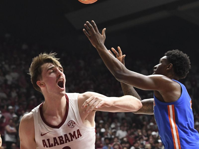 Feb 21, 2024; Tuscaloosa, Alabama, USA;  Alabama Crimson Tide forward Grant Nelson (2) reacts after a shot is blocked by Florida Gators forward Tyrese Samuel (4) at Coleman Coliseum. Mandatory Credit: Gary Cosby Jr.-USA TODAY Sports