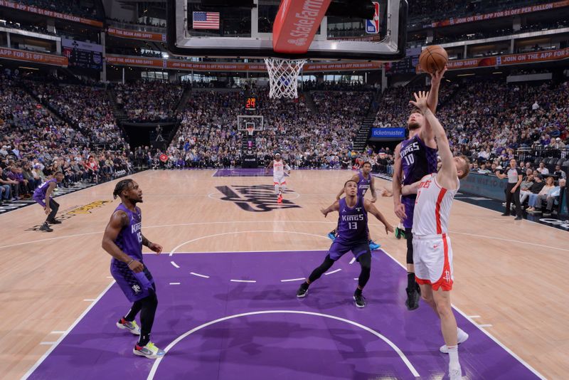 SACRAMENTO, CA - MARCH 10: Domantas Sabonis #10 of the Sacramento Kings goes up for the rebound during the game against the Houston Rockets on March 10, 2024 at Golden 1 Center in Sacramento, California. NOTE TO USER: User expressly acknowledges and agrees that, by downloading and or using this Photograph, user is consenting to the terms and conditions of the Getty Images License Agreement. Mandatory Copyright Notice: Copyright 2024 NBAE (Photo by Rocky Widner/NBAE via Getty Images)