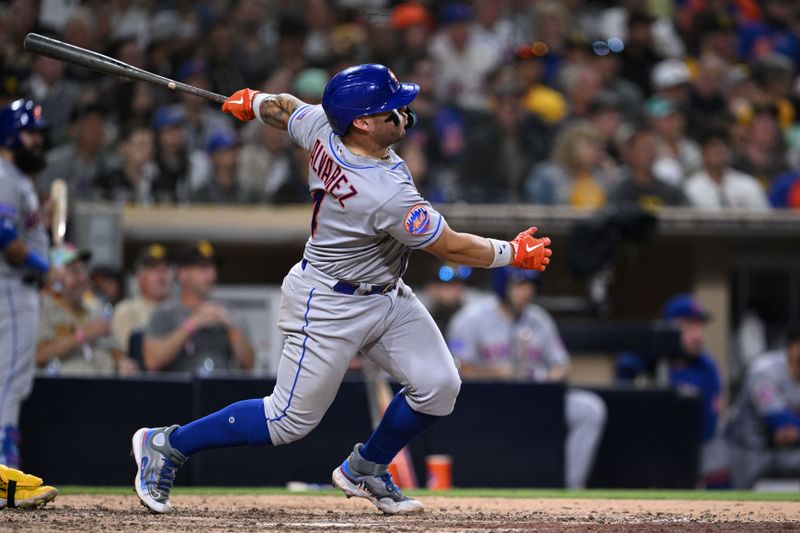 Jul 7, 2023; San Diego, California, USA; New York Mets catcher Francisco Alvarez (4) hits a single against the San Diego Padres during the eighth inning at Petco Park. Mandatory Credit: Orlando Ramirez-USA TODAY Sports