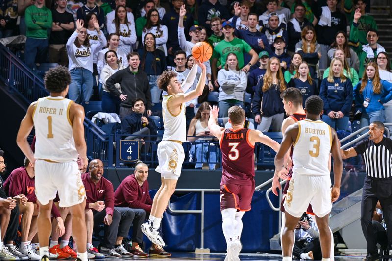 Feb 10, 2024; South Bend, Indiana, USA; Notre Dame Fighting Irish guard Braeden Shrewsberry (11) shoots a three point basket over Virginia Tech Hokies guard Sean Pedulla (3) in the first half at the Purcell Pavilion. Mandatory Credit: Matt Cashore-USA TODAY Sports