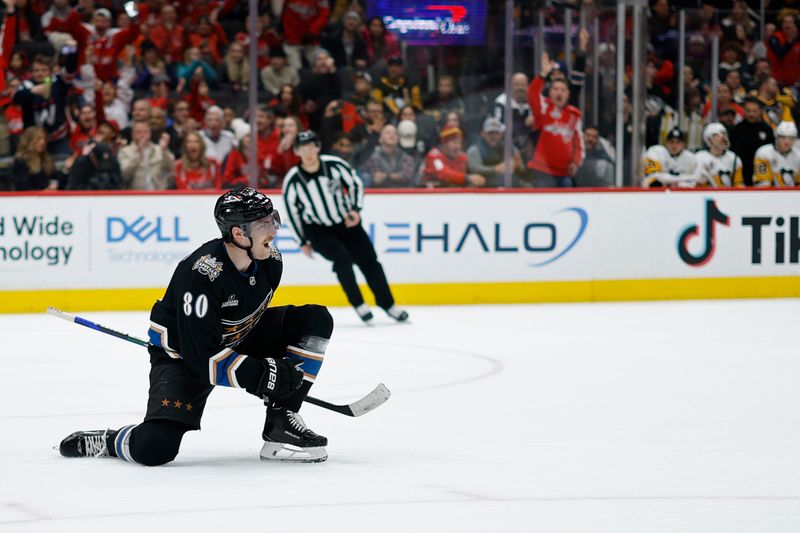 Jan 18, 2025; Washington, District of Columbia, USA; Washington Capitals left wing Pierre-Luc Dubois (80) celebrates after scoring a goal against the Pittsburgh Penguins in the third period at Capital One Arena. Mandatory Credit: Geoff Burke-Imagn Images