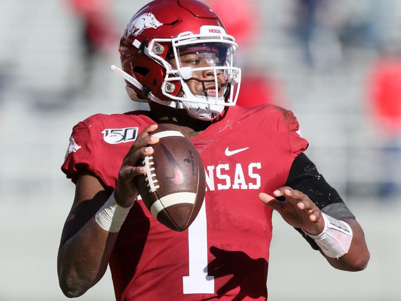 Nov 9, 2019; Fayetteville, AR, USA; Arkansas Razorbacks quarterback KJ Jefferson (1) rolls out to pass against the Western Kentucky Hilltoppers during the second half at Donald W. Reynolds Razorback Stadium. Western Kentucky won 45-19. Mandatory Credit: Nelson Chenault-USA TODAY Sports