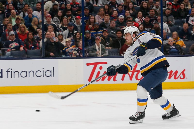 Dec 8, 2023; Columbus, Ohio, USA; St. Louis Blues center Robert Thomas (18) scores on a breakaway against the Columbus Blue Jackets during the first period at Nationwide Arena. Mandatory Credit: Russell LaBounty-USA TODAY Sports