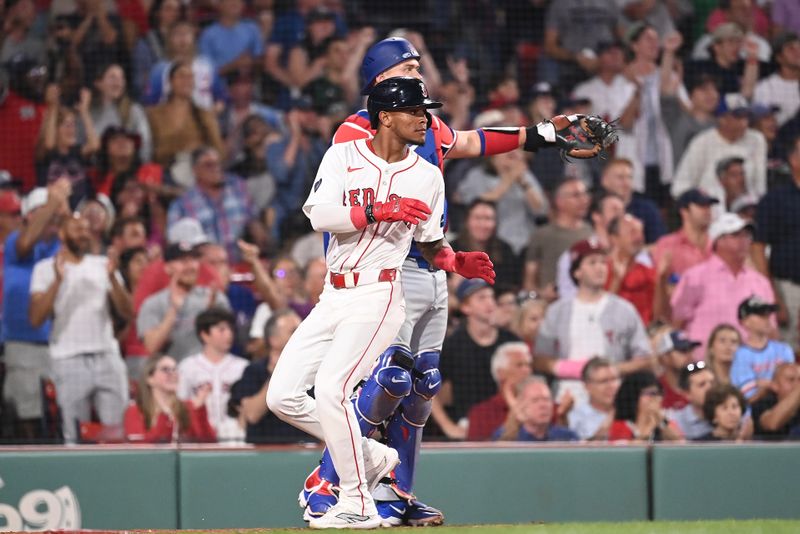 Aug 13, 2024; Boston, Massachusetts, USA; Boston Red Sox center fielder Ceddanne Rafaela (43) scores on a two run RBI by left fielder Rob Refsnyder (not pictured) during the fifth inning against the Texas Rangers at Fenway Park. Mandatory Credit: Eric Canha-USA TODAY Sports