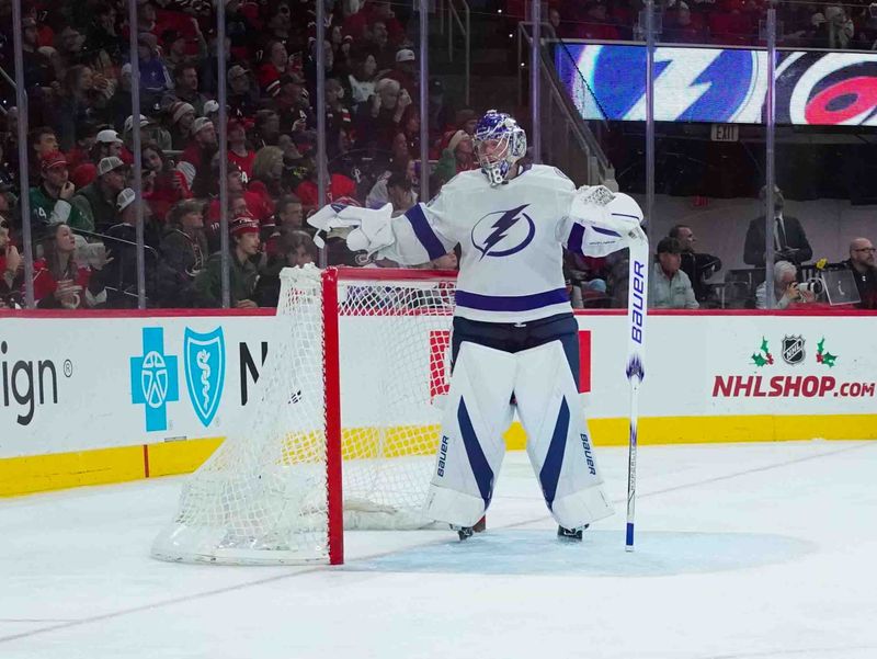 Nov 24, 2023; Raleigh, North Carolina, USA;  Tampa Bay Lightning goaltender Andrei Vasilevskiy (88) looks on against the Carolina Hurricanes during the first period at PNC Arena. Mandatory Credit: James Guillory-USA TODAY Sports