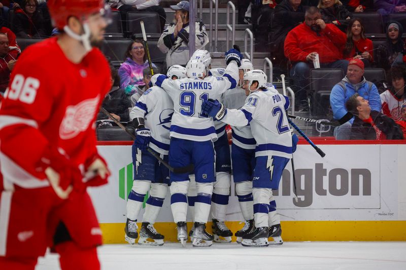 Jan 21, 2024; Detroit, Michigan, USA; The Tampa Bay Lightning celebrate a goal by defenseman Victor Hedman (77) during the first period at Little Caesars Arena. Mandatory Credit: Brian Bradshaw Sevald-USA TODAY Sports