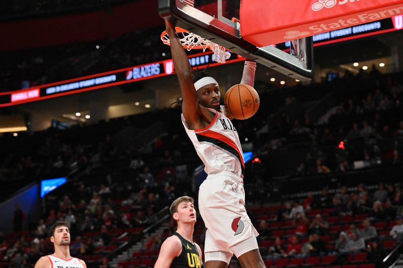 PORTLAND, OREGON - OCTOBER 18: Jerami Grant #9 of the Portland Trail Blazers dunks the ball during the third quarter of the preseason game against the Utah Jazz at Moda Center on October 18, 2024 in Portland, Oregon. NOTE TO USER: User expressly acknowledges and agrees that, by downloading and or using this photograph, User is consenting to the terms and conditions of the Getty Images License Agreement. (Photo by Alika Jenner/Getty Images)