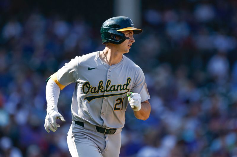 Sep 18, 2024; Chicago, Illinois, USA; Oakland Athletics first baseman Tyler Soderstrom (21) rounds the bases after hitting a solo home run against the Chicago Cubs during the fourth inning at Wrigley Field. Mandatory Credit: Kamil Krzaczynski-Imagn Images