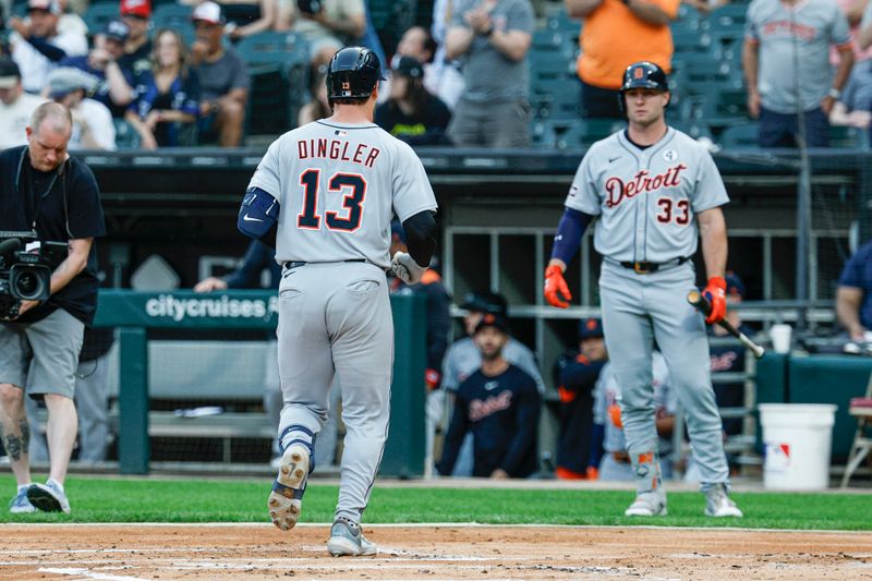 Jun 2, 2025; Chicago, Illinois, USA; Detroit Tigers catcher Dillon Dingler (13) crosses home plate after hitting a solo home run against the Chicago White Sox during the first inning at Rate Field. Mandatory Credit: Kamil Krzaczynski-Imagn Images