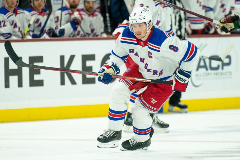 Oct 30, 2022; Tempe, Arizona, USA; New York Rangers defenseman Jacob Trouba (8) makes his way up the ice  against the Arizona Coyotes during the second period at Mullett Arena. Mandatory Credit: Allan Henry-USA TODAY Sports