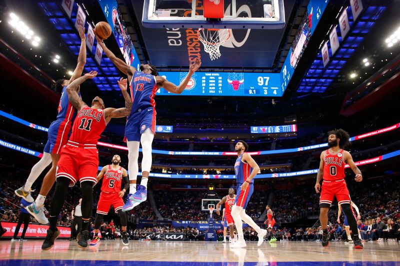 DETROIT, MI - APRIL 11: James Wiseman #13 of the Detroit Pistons grabs a rebound during the game against the Chicago Bulls on April 11, 2024 at Little Caesars Arena in Detroit, Michigan. NOTE TO USER: User expressly acknowledges and agrees that, by downloading and/or using this photograph, User is consenting to the terms and conditions of the Getty Images License Agreement. Mandatory Copyright Notice: Copyright 2024 NBAE (Photo by Brian Sevald/NBAE via Getty Images)