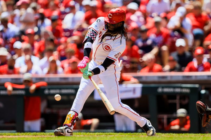 May 18, 2025; Cincinnati, Ohio, USA; Cincinnati Reds shortstop Elly De La Cruz (44) hits a single in the third inning against the Cleveland Guardians at Great American Ball Park. Mandatory Credit: Katie Stratman-Imagn Images