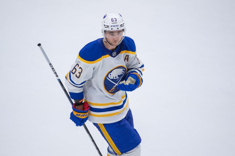 Sep 26, 2024; Ottawa, Ontario, CAN; Buffalo Sabres right wing Isak Rosen (63) scores in the third period against the Ottawa Senators  at the Canadian Tire Centre to take the game in overtime. Mandatory Credit: Marc DesRosiers-Imagn Images