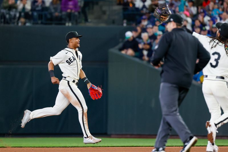 Jun 17, 2023; Seattle, Washington, USA; Seattle Mariners center fielder Julio Rodriguez (44) runs back to the dugout after catching a fly-out against the Chicago White Sox to end the top of the sixth inning at T-Mobile Park. Mandatory Credit: Joe Nicholson-USA TODAY Sports