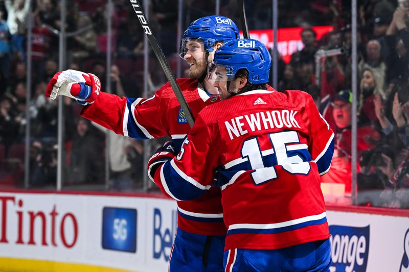 Apr 4, 2024; Montreal, Quebec, CAN; Montreal Canadiens right wing Joel Armia (40) celebrates his goal against the Tampa Bay Lightning with center Alex Newhook (15) during the first period at Bell Centre. Mandatory Credit: David Kirouac-USA TODAY Sports