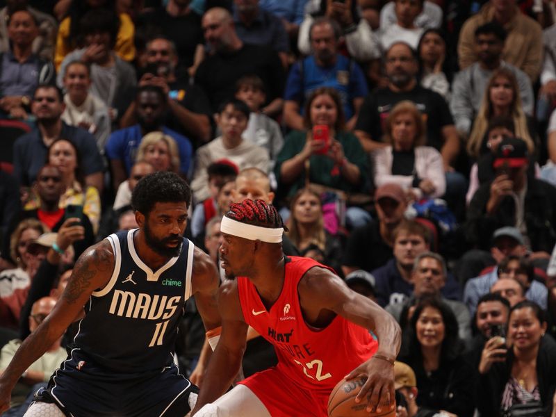 MIAMI, FL - NOVEMBER 24: Jimmy Butler #22 of the Miami Heat dribbles the ball during the game against the Dallas Mavericks on November 24, 2024 at Kaseya Center in Miami, Florida. NOTE TO USER: User expressly acknowledges and agrees that, by downloading and or using this Photograph, user is consenting to the terms and conditions of the Getty Images License Agreement. Mandatory Copyright Notice: Copyright 2024 NBAE (Photo by Issac Baldizon/NBAE via Getty Images)