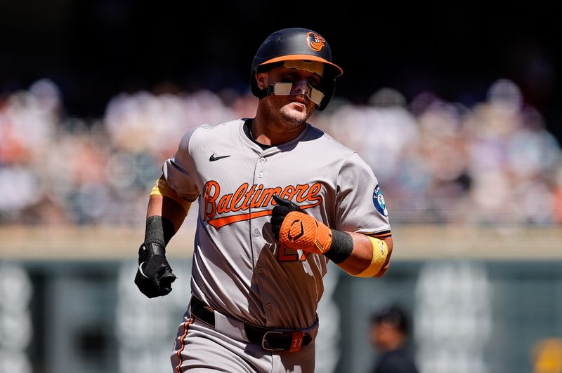 Sep 1, 2024; Denver, Colorado, USA; Baltimore Orioles catcher James McCann (27) rounds the bases on a two run home run in the fourth inning against the Colorado Rockies at Coors Field. Mandatory Credit: Isaiah J. Downing-USA TODAY Sports