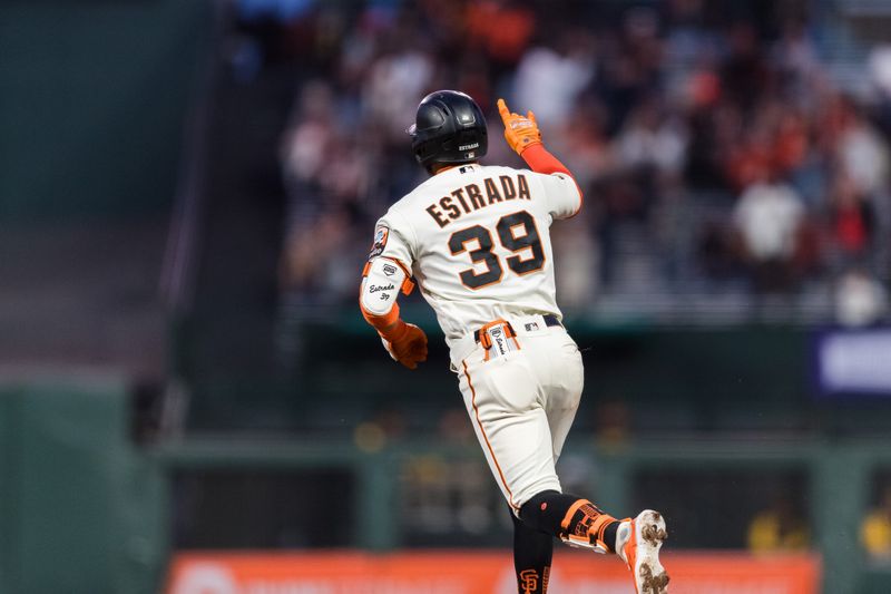 Sep 27, 2023; San Francisco, California, USA; San Francisco Giants second baseman Thairo Estrada (39) gestures as he runs the bases after hitting a solo home run against the San Diego Padres during the second inning at Oracle Park. Mandatory Credit: John Hefti-USA TODAY Sports