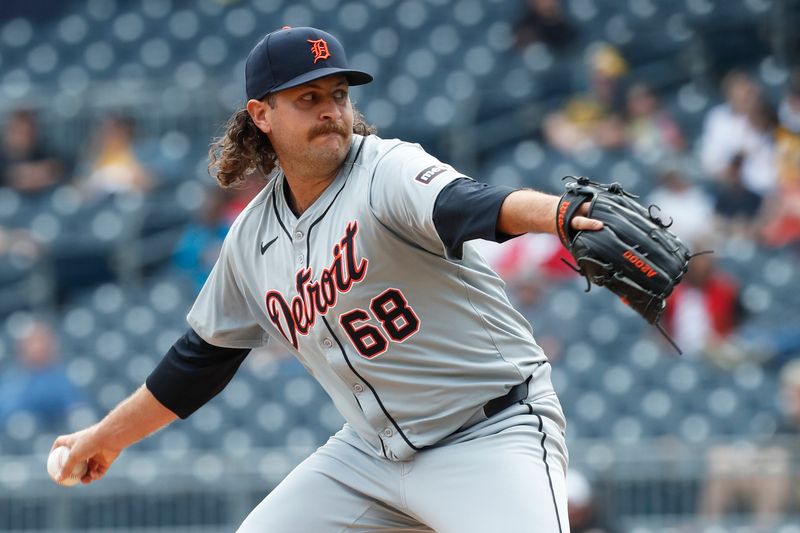 Apr 9, 2024; Pittsburgh, Pennsylvania, USA;  Detroit Tigers relief pitcher Jason Foley (68) throws against the Pittsburgh Pirates during the ninth inning at PNC Park. Detroit won 5-3. Mandatory Credit: Charles LeClaire-USA TODAY Sports