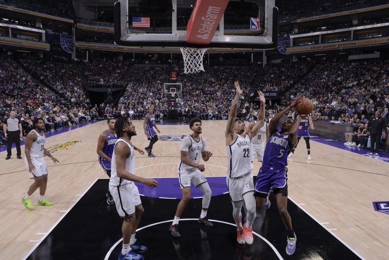 SACRAMENTO, CA - NOVEMBER 24: De'Aaron Fox #5 of the Sacramento Kings shoots the ball during the game against the Brooklyn Nets on November 24, 2024 at Golden 1 Center in Sacramento, California. NOTE TO USER: User expressly acknowledges and agrees that, by downloading and or using this Photograph, user is consenting to the terms and conditions of the Getty Images License Agreement. Mandatory Copyright Notice: Copyright 2024 NBAE (Photo by Rocky Widner/NBAE via Getty Images)