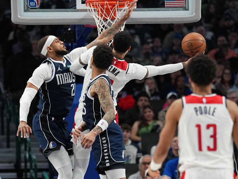 DALLAS, TX - FEBRUARY 12: Daniel Gafford #21 of the Dallas Mavericks plays defense against Kyle Kuzma #33 of the Washington Wizards on February 12, 2024 at the American Airlines Center in Dallas, Texas. NOTE TO USER: User expressly acknowledges and agrees that, by downloading and or using this photograph, User is consenting to the terms and conditions of the Getty Images License Agreement. Mandatory Copyright Notice: Copyright 2024 NBAE (Photo by Glenn James/NBAE via Getty Images)