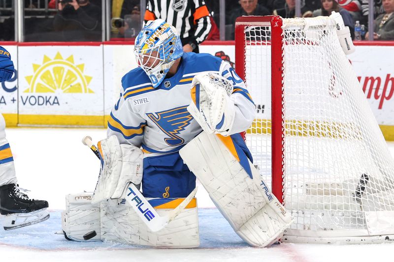 Nov 26, 2025; Newark, New Jersey, USA; St. Louis Blues goaltender Jordan Binnington (50) makes a save against the New Jersey Devils during the second period at Prudential Center. Mandatory Credit: Ed Mulholland-Imagn Images