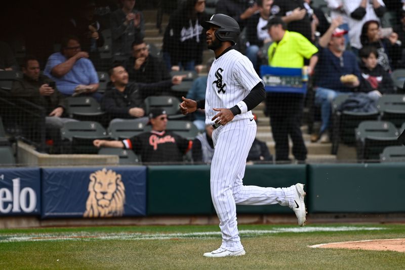 Apr 5, 2023; Chicago, Illinois, USA;  Chicago White Sox second baseman Elvis Andrus (1) scores against the San Francisco Giants during the fifth inning at Guaranteed Rate Field. Mandatory Credit: Matt Marton-USA TODAY Sports