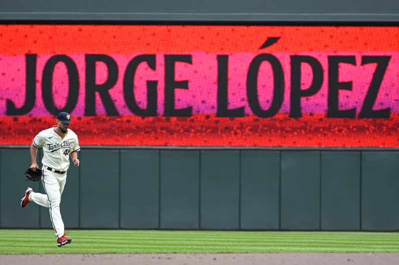 Apr 23, 2023; Minneapolis, Minnesota, USA;  Minnesota Twins pitcher Jorge Lopez (48) runs to the mound against the Washington Nationals at Target Field. Mandatory Credit: Nick Wosika-USA TODAY Sports