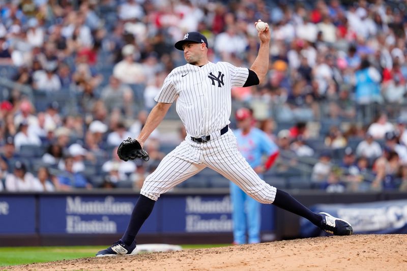 Aug 31, 2024; Bronx, New York, USA; New York Yankees pitcher Tim Mayza (58) delivers against the St. Louis Cardinals during the eighth inning at Yankee Stadium. Mandatory Credit: Gregory Fisher-USA TODAY Sports