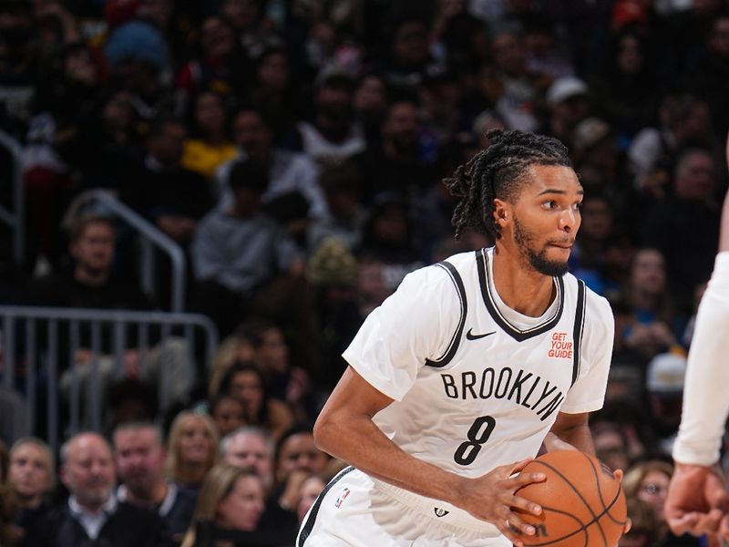 DENVER, CO - JANUARY 10:  Ziaire Williams #8 of the Brooklyn Nets handles the ball during the game against the Denver Nuggets on January 10, 2025 at Ball Arena in Denver, Colorado. NOTE TO USER: User expressly acknowledges and agrees that, by downloading and/or using this Photograph, user is consenting to the terms and conditions of the Getty Images License Agreement. Mandatory Copyright Notice: Copyright 2025 NBAE (Photo by Bart Young/NBAE via Getty Images)