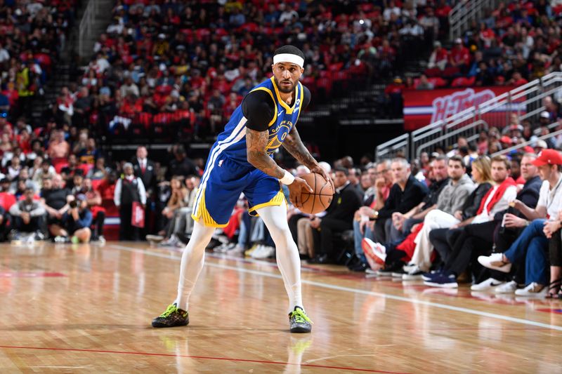 HOUSTON, TX - APRIL 4: Gary Payton II #0 of the Golden State Warriors handles the ball during the game against the Houston Rockets on April 4, 2024 at the Toyota Center in Houston, Texas. NOTE TO USER: User expressly acknowledges and agrees that, by downloading and or using this photograph, User is consenting to the terms and conditions of the Getty Images License Agreement. Mandatory Copyright Notice: Copyright 2024 NBAE (Photo by Logan Riely/NBAE via Getty Images)