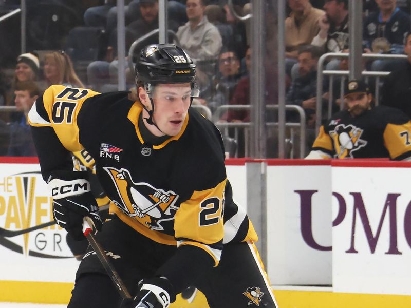 Mar 24, 2026; Pittsburgh, Pennsylvania, USA;  Pittsburgh Penguins left wing Elmer Soderblom (25) skates with the puck against the Colorado Avalanche at PPG Paints Arena. Mandatory Credit: Charles LeClaire-Imagn Images