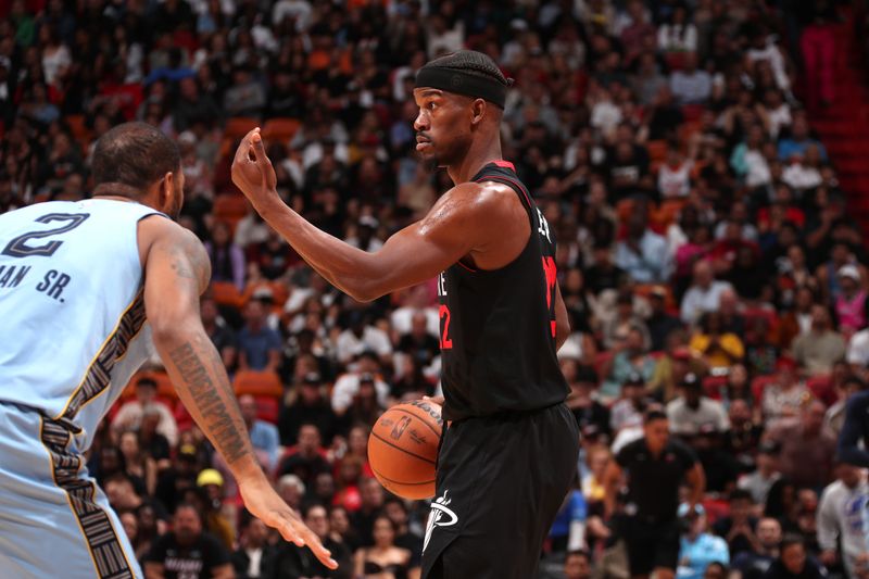 MIAMI, FL - JANUARY 24:  Jimmy Butler #22 of the Miami Heat handles the ball during the game against the Memphis Grizzlies on January 24, 2024 at Kaseya Center in Miami, Florida. NOTE TO USER: User expressly acknowledges and agrees that, by downloading and or using this Photograph, user is consenting to the terms and conditions of the Getty Images License Agreement. Mandatory Copyright Notice: Copyright 2024 NBAE (Photo by Issac Baldizon/NBAE via Getty Images)