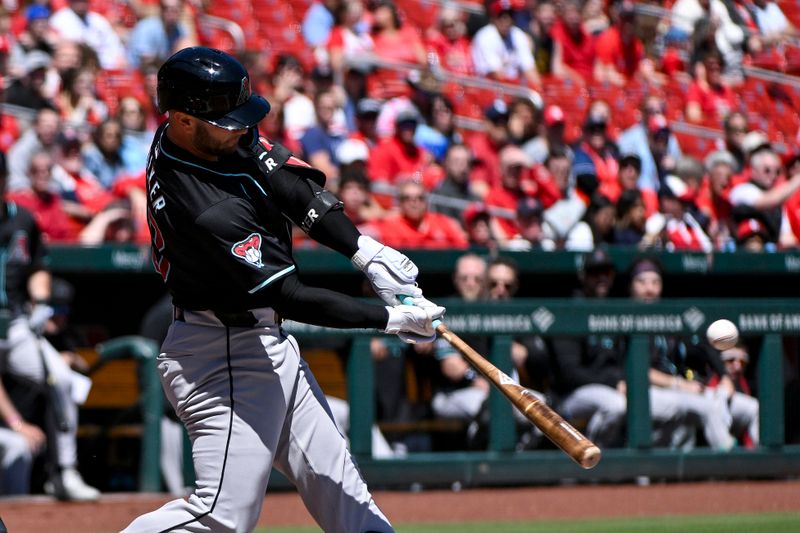Apr 24, 2024; St. Louis, Missouri, USA;  Arizona Diamondbacks first baseman Christian Walker (53) hits a one run sacrifice fly against the St. Louis Cardinals during the first inning at Busch Stadium. Mandatory Credit: Jeff Curry-USA TODAY Sports
