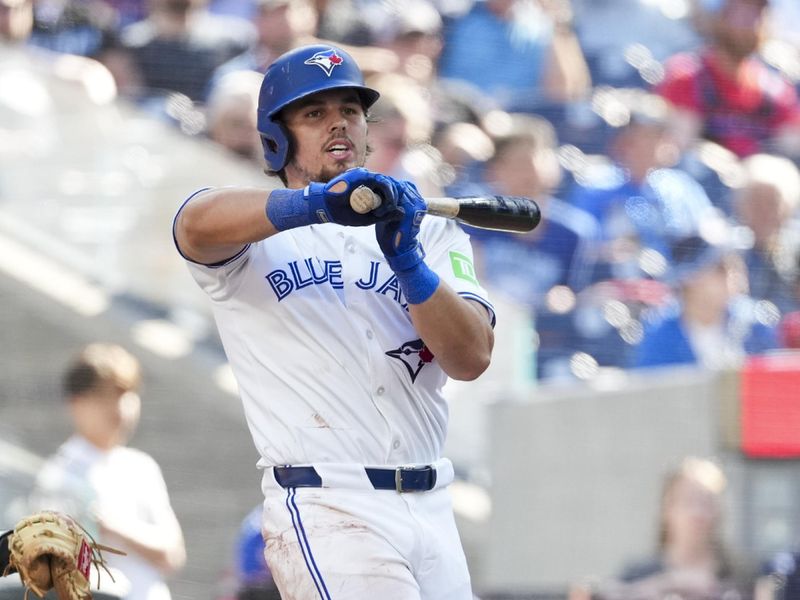 May 15, 2025; Toronto, Ontario, CAN; Toronto Blue Jays outfielder Addison Barger (47) takes a bat against the Tampa Bay Rays during the seventh inning at Rogers Centre. Mandatory Credit: Kevin Sousa-Imagn Images