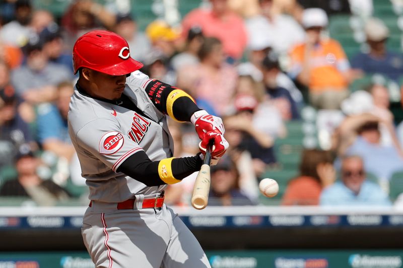 Sep 14, 2023; Detroit, Michigan, USA; Cincinnati Reds shortstop Noelvi Marte (16) hits a single in the eighth inning against the Detroit Tigers at Comerica Park. Mandatory Credit: Rick Osentoski-USA TODAY Sports