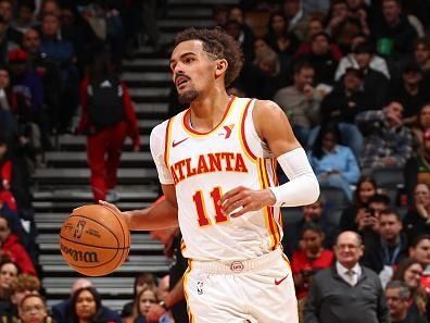 TORONTO, CANADA - DECEMBER 13: Trae Young #11 of the Atlanta Hawks brings the ball up court against the Toronto Raptors on December 13, 2023 at the Scotiabank Arena in Toronto, Ontario, Canada.  NOTE TO USER: User expressly acknowledges and agrees that, by downloading and or using this Photograph, user is consenting to the terms and conditions of the Getty Images License Agreement.  Mandatory Copyright Notice: Copyright 2023 NBAE (Photo by Vaughn Ridley/NBAE via Getty Images)