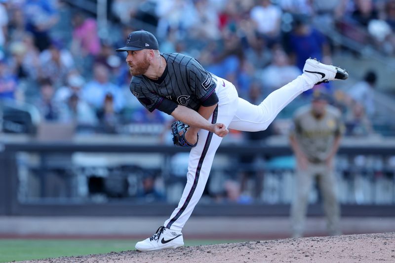 Jun 15, 2024; New York City, New York, USA; New York Mets relief pitcher Reed Garrett (75) follows through on a pitch against the San Diego Padres during the ninth inning at Citi Field. Mandatory Credit: Brad Penner-USA TODAY Sports