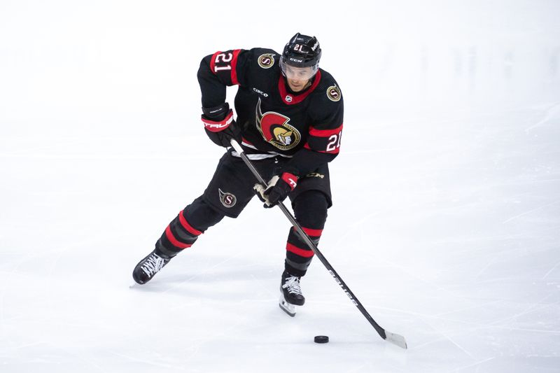 Apr 6, 2024; Ottawa, Ontario, CAN; Ottawa Senators right wing Mathieu Joseph (21) skates with the puck in the third period against the New Jersey Devils at the Canadian Tire Centre. Mandatory Credit: Marc DesRosiers-USA TODAY Sports