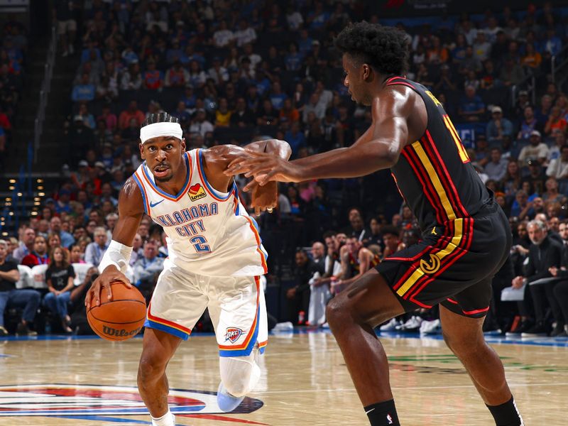 OKLAHOMA CITY, OK - OCTOBER 27: Shai Gilgeous-Alexander #2 of the Oklahoma City Thunder drives to the basket during the game on October 27, 2024 at Paycom Center in Oklahoma City, Oklahoma. NOTE TO USER: User expressly acknowledges and agrees that, by downloading and or using this photograph, User is consenting to the terms and conditions of the Getty Images License Agreement. Mandatory Copyright Notice: Copyright 2024 NBAE (Photo by Zach Beeker/NBAE via Getty Images)