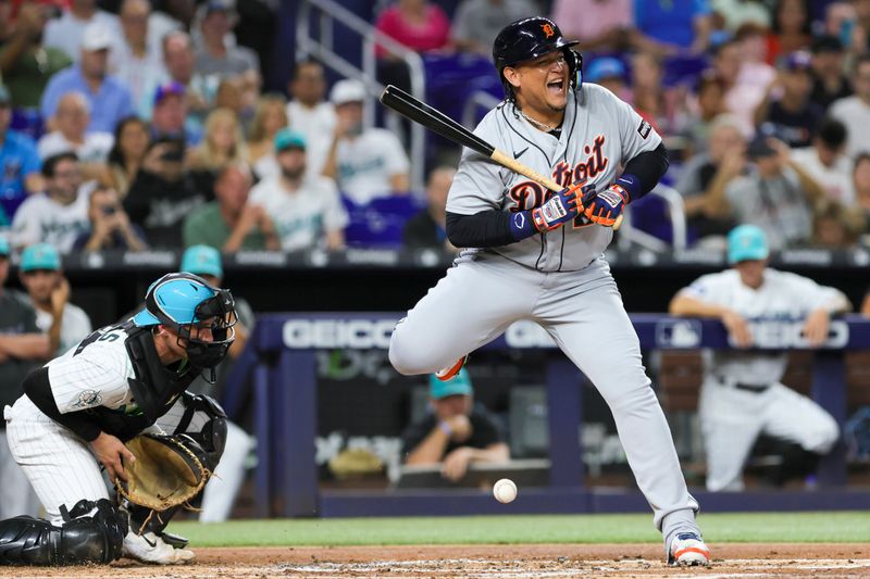 Jul 28, 2023; Miami, Florida, USA; Detroit Tigers designated hitter Miguel Cabrera (24) reacts after a hit-by-pitch against the Miami Marlins during the second inning at loanDepot Park. Mandatory Credit: Sam Navarro-USA TODAY Sports