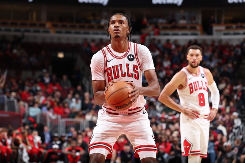 CHICAGO, IL - OCTOBER 12: Julian Phillips #15 of the Chicago Bulls shoots a free throw during the game against the Memphis Grizzlies during a NBA preseason game on October 12, 2024 at United Center in Chicago, Illinois. NOTE TO USER: User expressly acknowledges and agrees that, by downloading and or using this photograph, User is consenting to the terms and conditions of the Getty Images License Agreement. Mandatory Copyright Notice: Copyright 2024 NBAE (Photo by Jeff Haynes/NBAE via Getty Images)