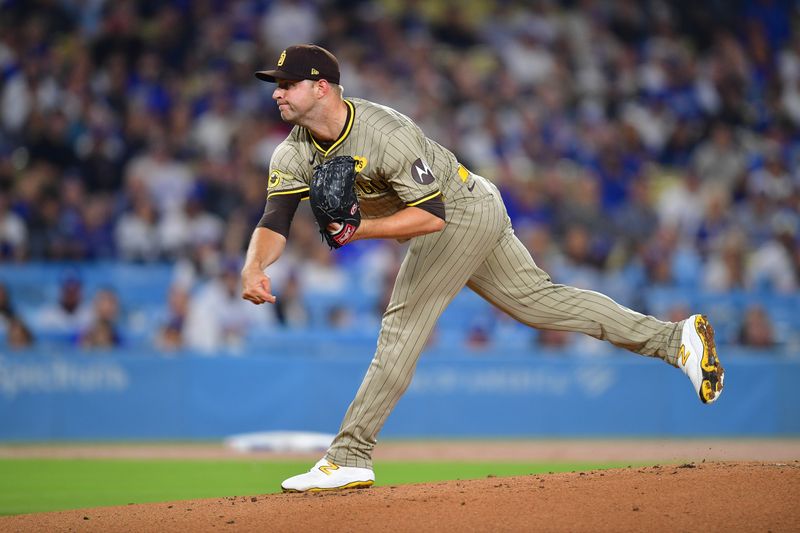 Sep 24, 2024; Los Angeles, California, USA; San Diego Padres pitcher Michael King (34) throws against the Los Angeles Dodgers during the first inning at Dodger Stadium. Mandatory Credit: Gary A. Vasquez-Imagn Images